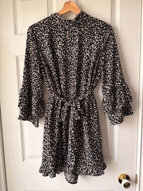 Dynamite Black Floral Ruffle-Sleeve Romper with Red & White floral accents